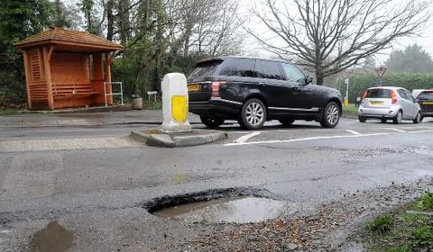 Councils face funding cuts over pothole repairs