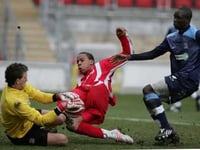 Woking sign Loick Pires from Welling