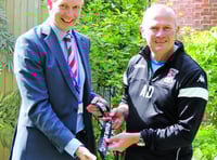 Dowson donates medal in aid of hospice auction