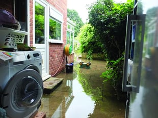 Burst water main floods homes again