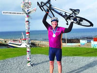 Cyclist completes epic bike ride for Woking and Sam Beare hospices