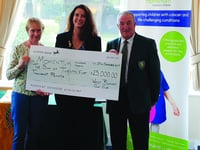 West Byfleet Golf Club presents record fundraising pot to local charities