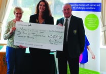 West Byfleet Golf Club presents record fundraising pot to local charities