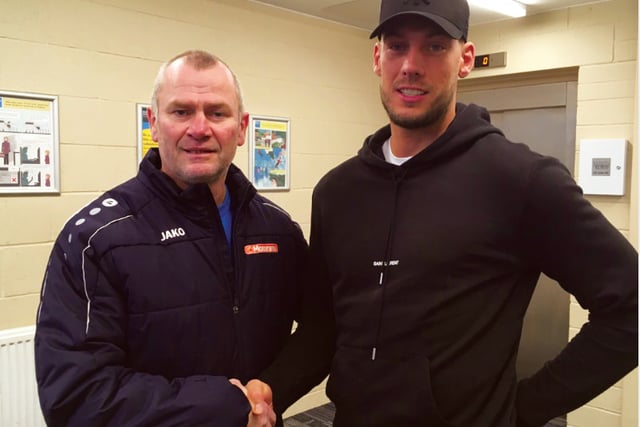 Cards snap up striker