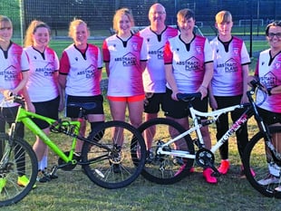 Woking FC Ladies get on their bikes for first-team