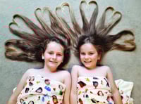 Sisters give hair-raising donation to children's charity