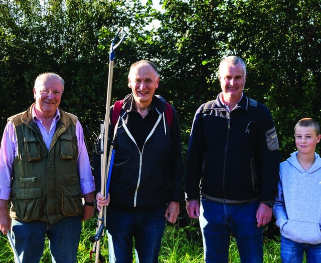 Villagers get stuck in to tackle community ditch project