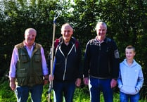 Villagers get stuck in to tackle community ditch project