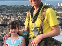 Top award for barefoot fundraiser Chris