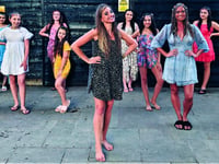 Dance group perform pop video with message of hope