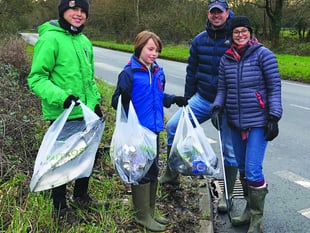 Scouts get to work on village clear-up