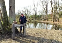 Recognition for villager who suggested flood-averting pond