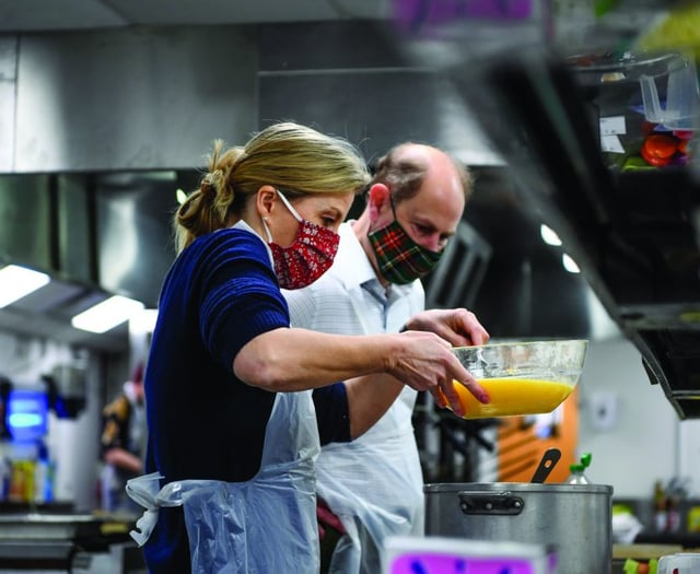 Royals cook lunch and pack supplies at homelessness project