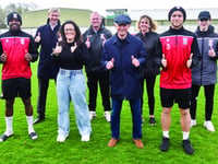 Woking FC players and staff all aiming for a place on the wing