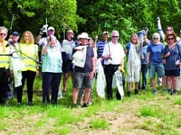 Spring clean volunteers collect a mound of litter