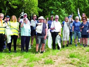 Spring clean volunteers collect a mound of litter