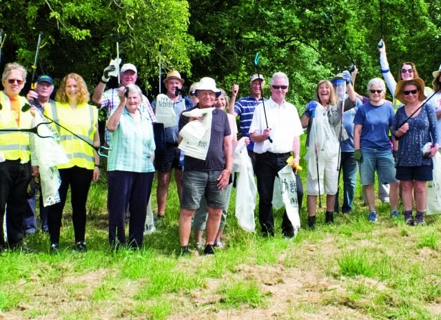 Spring clean volunteers collect a mound of litter