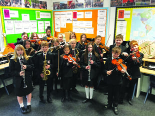 Community efforts help children to begin making music