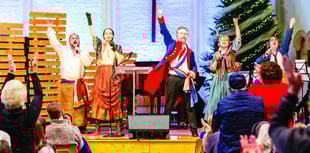 Les Miserables stars rouse carol concert, thanks to singing estate agent