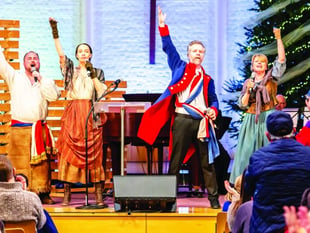 Les Miserables stars rouse carol concert, thanks to singing estate agent