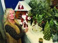 Window dressing creates a magical forest for Santa