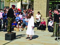 Crowds bear witness to Easter crucifixion