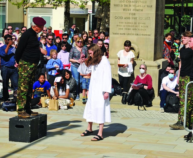 Crowds bear witness to Easter crucifixion
