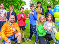 Fitness group’s fun run supports Ukrainian family