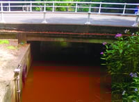 Concern as river runs dark brown
