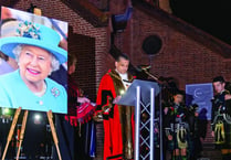 Residents pay a final tribute to Her Majesty