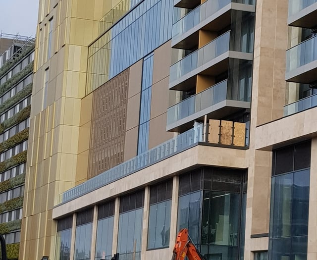New Hilton Hotel won’t open until at least next October