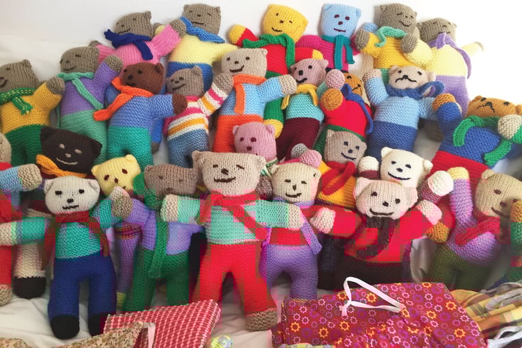 Array of knitted teddies