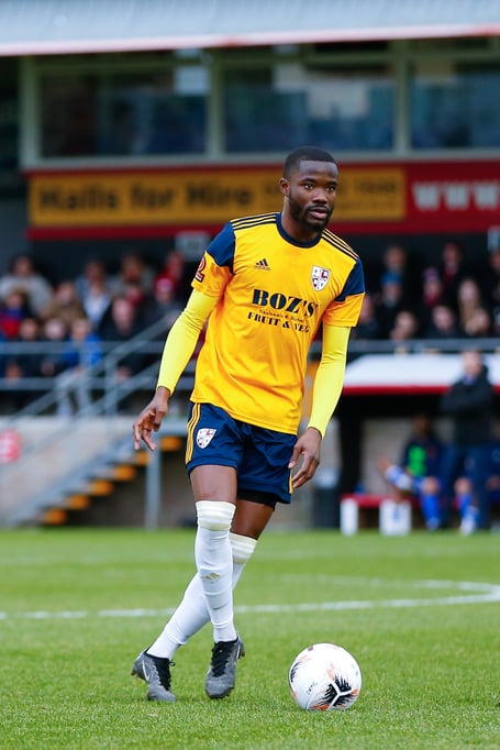 Woking midfielder Solomon Nwabuokei.