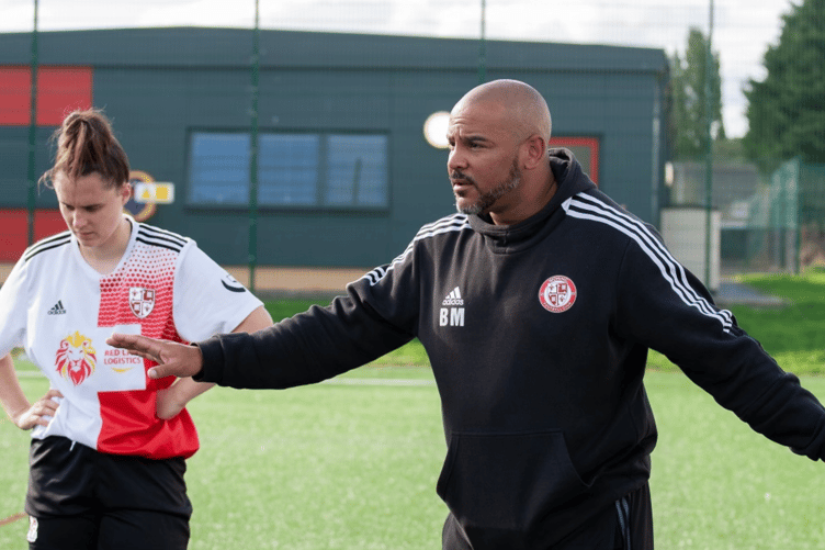 Woking Women manager Benson Miyoba.