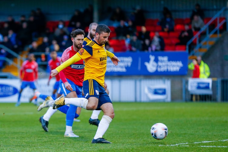 Woking striker Pádraig Amond.