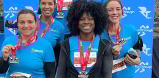 Woking fitness group raise funds for charity at Surrey Half Marathon