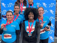 Woking fitness group raise funds for charity at Surrey Half Marathon