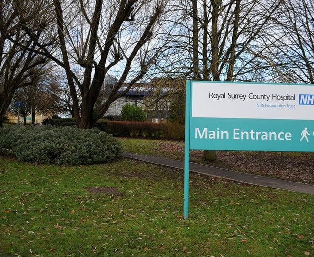 Woman hit by car outside Royal Surrey Hospital dies