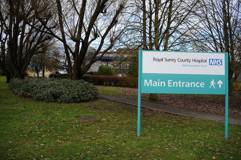 Woman hit by car outside Royal Surrey Hospital dies
