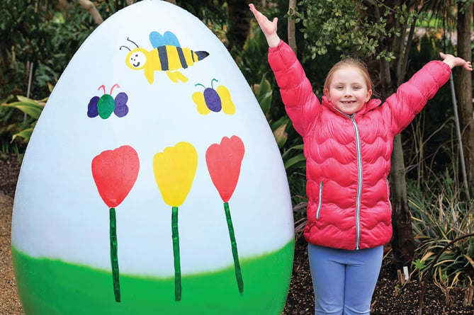 Winners and family members pictured with their Easter egg designs at the start of the Easter Egg Hunt and RHS Garden Wisley.