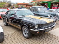 Classic cars alongside new cafe 