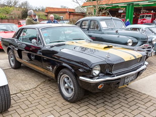 Classic cars alongside new cafe 