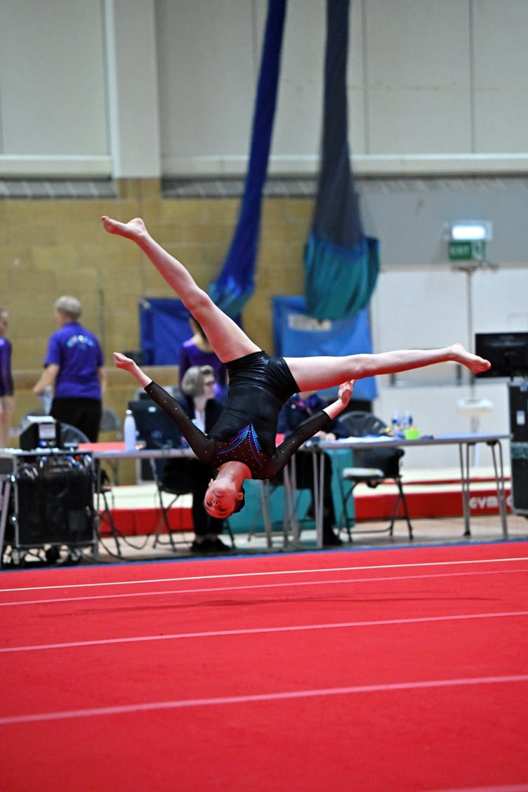 Georgia Thomas performing a free cartwheel