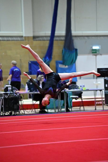 Georgia Thomas performing a free cartwheel