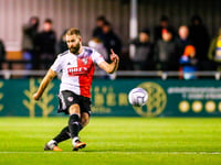 Camaraderie will boost push for League Two place, says Woking defender