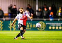 Camaraderie will boost push for League Two place, says Woking defender