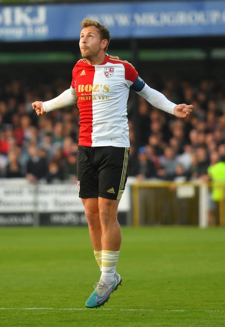 Woking captain Josh Casey.