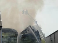 Byfleet blaze which destroyed warehouse also damaged other businesses