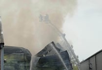 Byfleet blaze which destroyed warehouse also damaged other businesses