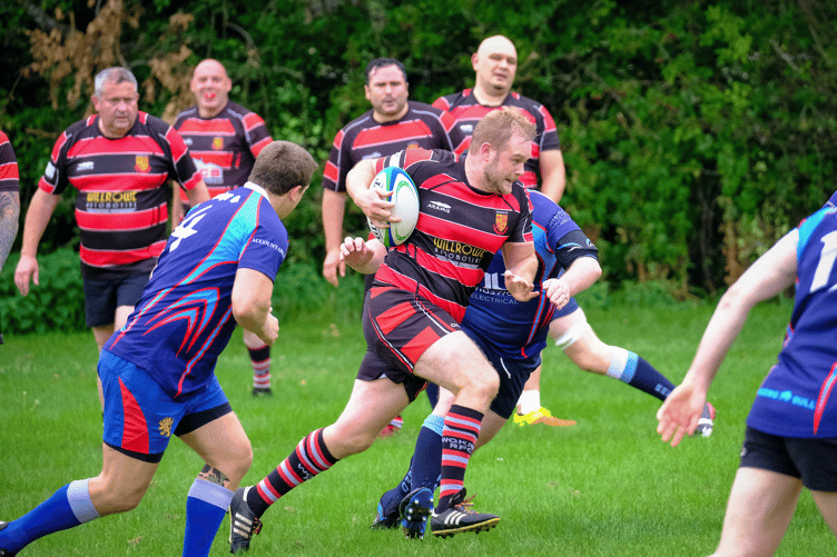 Mark Rose in playing action for Woking.
